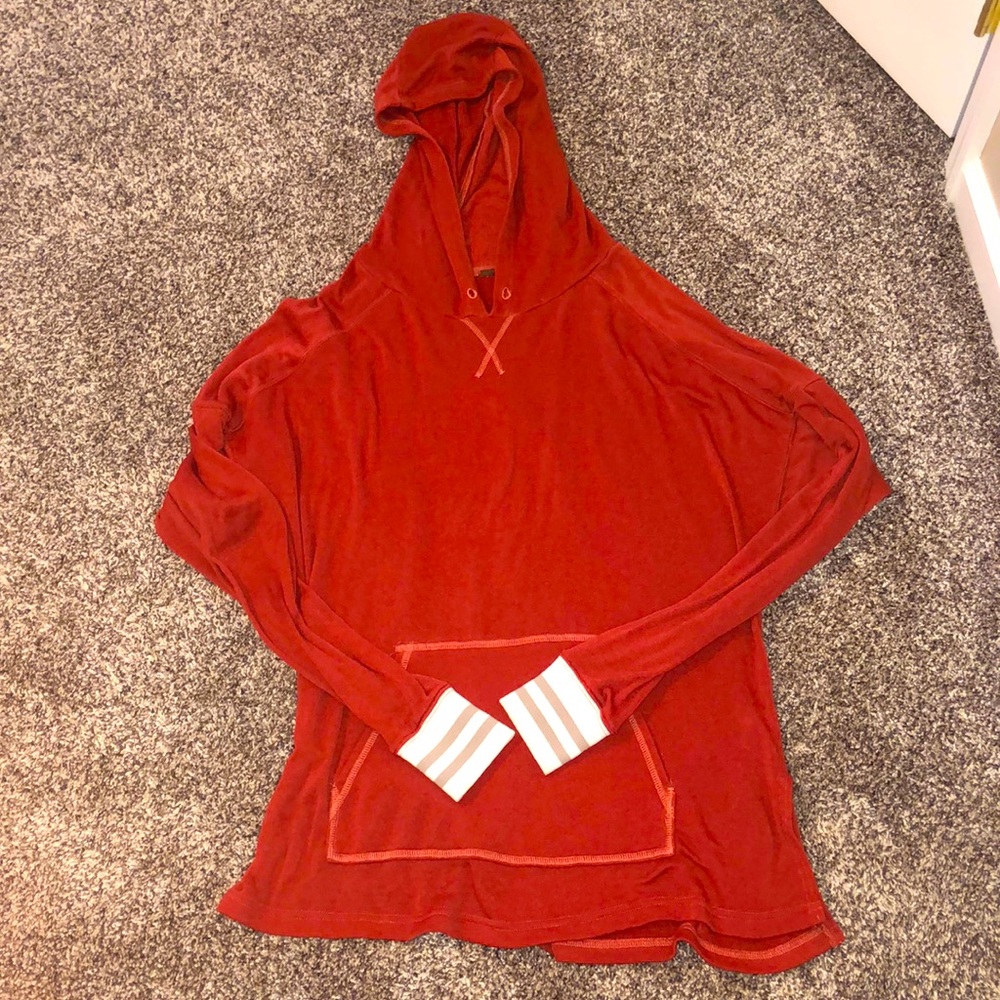 FREE PEOPLE burnt orange sweatshirt in a size S